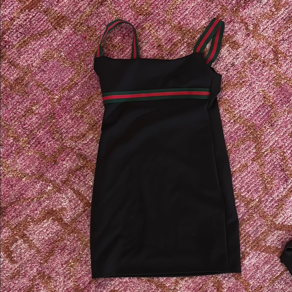 Elegant Black Dress with Striped Detail